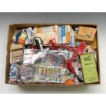 Mixed Toys: A large banana box containing cereal giveaways, Lego kits, Subbuteo, Trade cards etc.