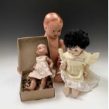 Four dolls and two jigsaws in one box.