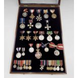 An important 3 generation naval group of medals from the Norman family contained in framed &