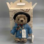 Teddy Bear - Boxed Steiff. Blue coated, black hat. 50th anniversary Paddington Bear 2008. No