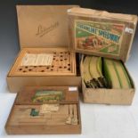 A 'Streamline' Speedway tinplate toy racing game, a Renaissance Baukunst building block game and a