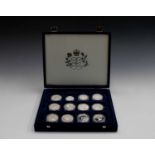 Silver proof coins - 14 crown size including GB £5 coins x 2 others are Commonwealth inc.