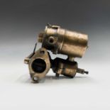 A vintage brass part carburetor, by Andersons Ltd, with open/shut lever height 14cm.