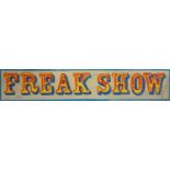 A sign written wooden sign 'FREAK SHOW'. 20 x 105.5cm. Condition report: A reclaimed wooden plank