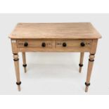 A painted pine side table, with two frieze drawers on turned tapering supports, height 72cm, width