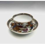 A Newhall porcelain tea bowl and saucer, circa 1795, painted and gilt decorated pattern number