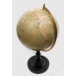 A Philips 19 inch terrestial globe on turned ebonised stand with circular base. Overall height