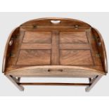 A George III style mahogany butlers tray on stand, height 48cm, width 76cm, depth 55cm.