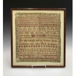 A George III period sampler worked by Amy Norton, embroidered with the alphabet and verse, and dated