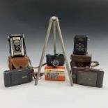 A Voigtlander Brilliant camera and case, height 12cm, together with four other cameras and a