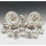 An assortment of Dresden floral painted porcelain, mainly teaware.