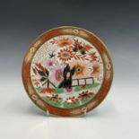 A Barr, Flight and Barr Worcester porcelain plate, painted in the Imari palette with flowers and