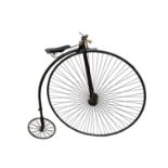 A Victorian black japanned metal ordinary bicycle or "Penny-Farthing" - "The Humber", by Thomas