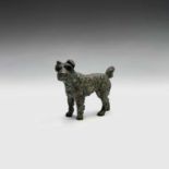 An Austrian cold painted figure of a terrier. Height 6cm.