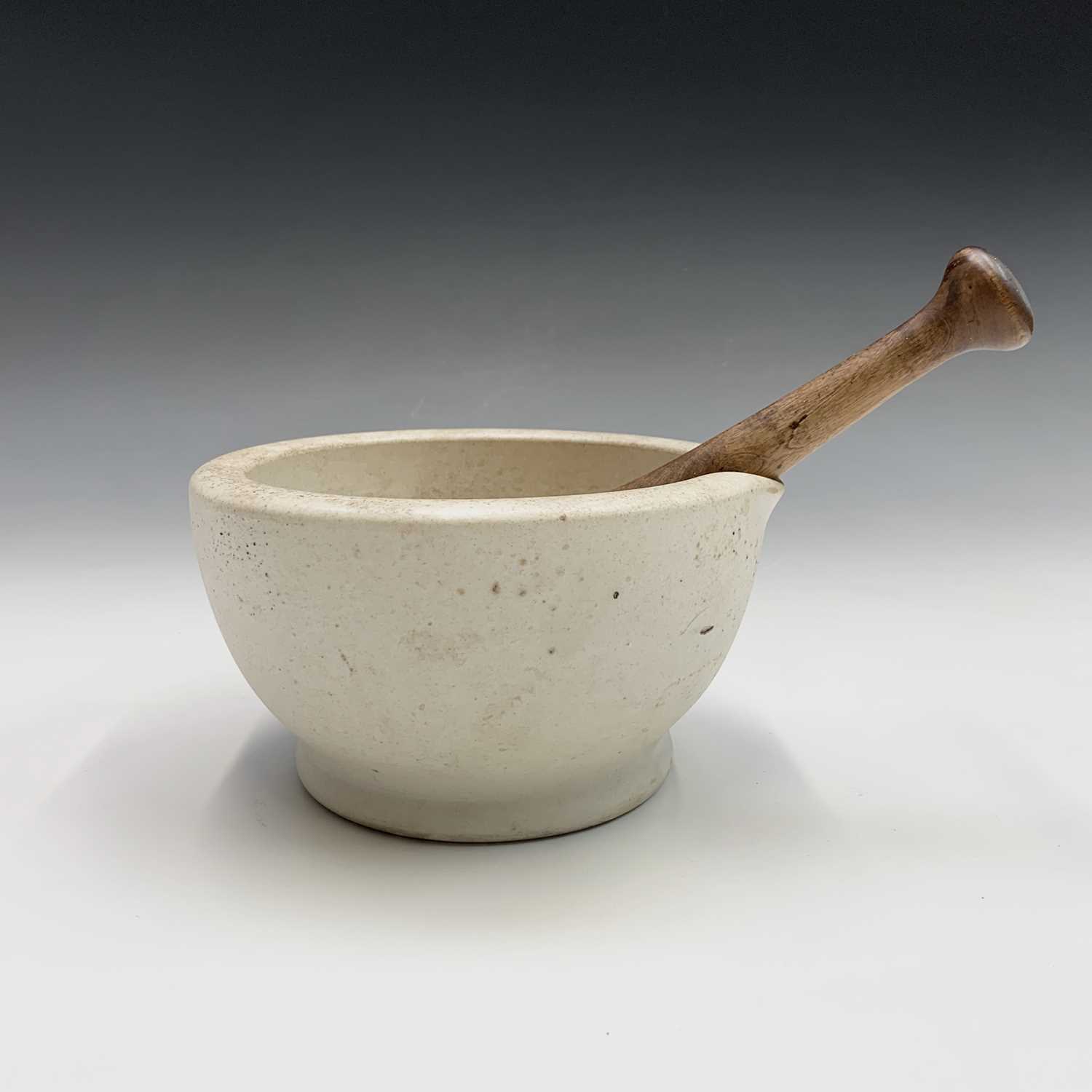 A pestle and mortar. Height of mortar 11cm, length of pestle 22.5cm. - Image 2 of 6