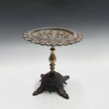 A 19th century cast iron and brass trivet or kettle stand, in the style of Dr Christopher Dresser,