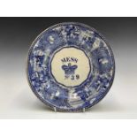 An Edwardian blue and white pottery Naval mess plate, the border printed with maritime scenes and