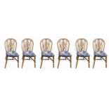 A set of six beech and elm wheelback kitchen chairs, mid 20th century.Condition report: No