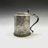 A Stuart pewter tankard by Samuel Booth of York 17th century, with wriggle-work decoration of tulips