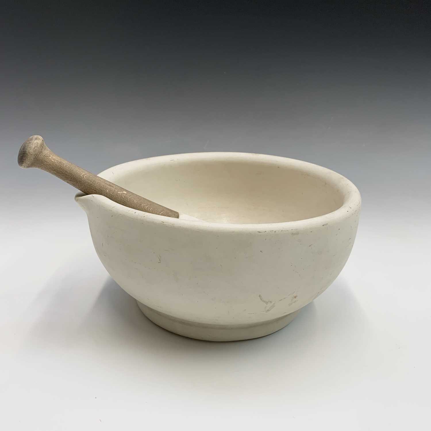 A pestle and mortar. Height of mortar 11cm, length of pestle 22.5cm. - Image 6 of 6