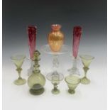 A pair of Victorian cranberry and clear glass vases, height 31cm, together with a clear glass tazza,