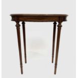 A Louis XVI style mahogany oval occasional table, stamped number 2631, with turned and fluted