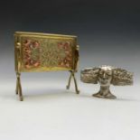 A beautiful Art Nouveau copper and brass letter rack, repousse decorated with poppies and