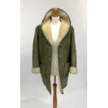 A 1960s olive green sheepskin coat by Antartex of Loch Lomond (Suppliers to the British & New