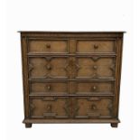A Jacobean style oak chest of drawers, with four long drawers on stile feet, height 90cm, width