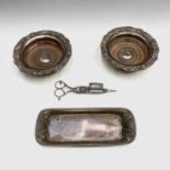 A pair of Regency Old Sheffield plate candle snuffers and tray, with leaf moulded decoration, length