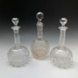 A Victorian cut glass claret decanter and stopper, monogrammed PM, height 31cm, together with a pair