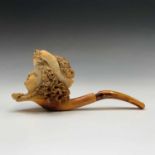 A cased Meershaum pipe with amber mouth piece, the bowl in the form of the head of a lady wearing an