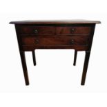 A George III mahogany lowboy, with a rectangular crossbanded top above two short and one long