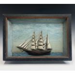 A late 19th century diorama, the three masted ship on a painted background, height 41.5cm, width