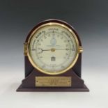A Sewills of Liverpool bulkhead type brass cased barometer, commemorating the 50th anniversary of