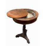 A unusual rosewood stand, early 19th century, the circular top with a central cover above a metal