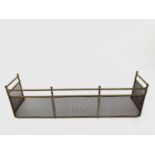A Victorian brass fender with tubular top rail, mesh front and sides. 122cm x 30cm overall.
