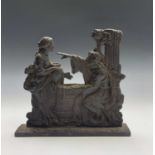 A cast iron door stop, mid 19th century, modelled as Rebecca at the well, height 27cm.