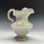 A Charles Meigh white jug. Height 14.5cm.