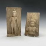 A South East Asian stone panel of a figure in a headdress, height 27cm, together with another