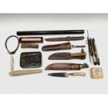 A Webley & Scott 12 bore/.410 cartridge adaptor, boxed, together two horn handled sheath knives,