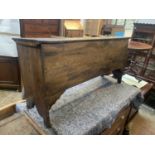An elm sword chest, 17th century, height 61cm, width 121cm, depth 38cm.Condition report: Chips to