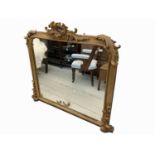 A Victorian giltwood overmantel mirror, with applied scriolling foliage decoration, height 123cm,