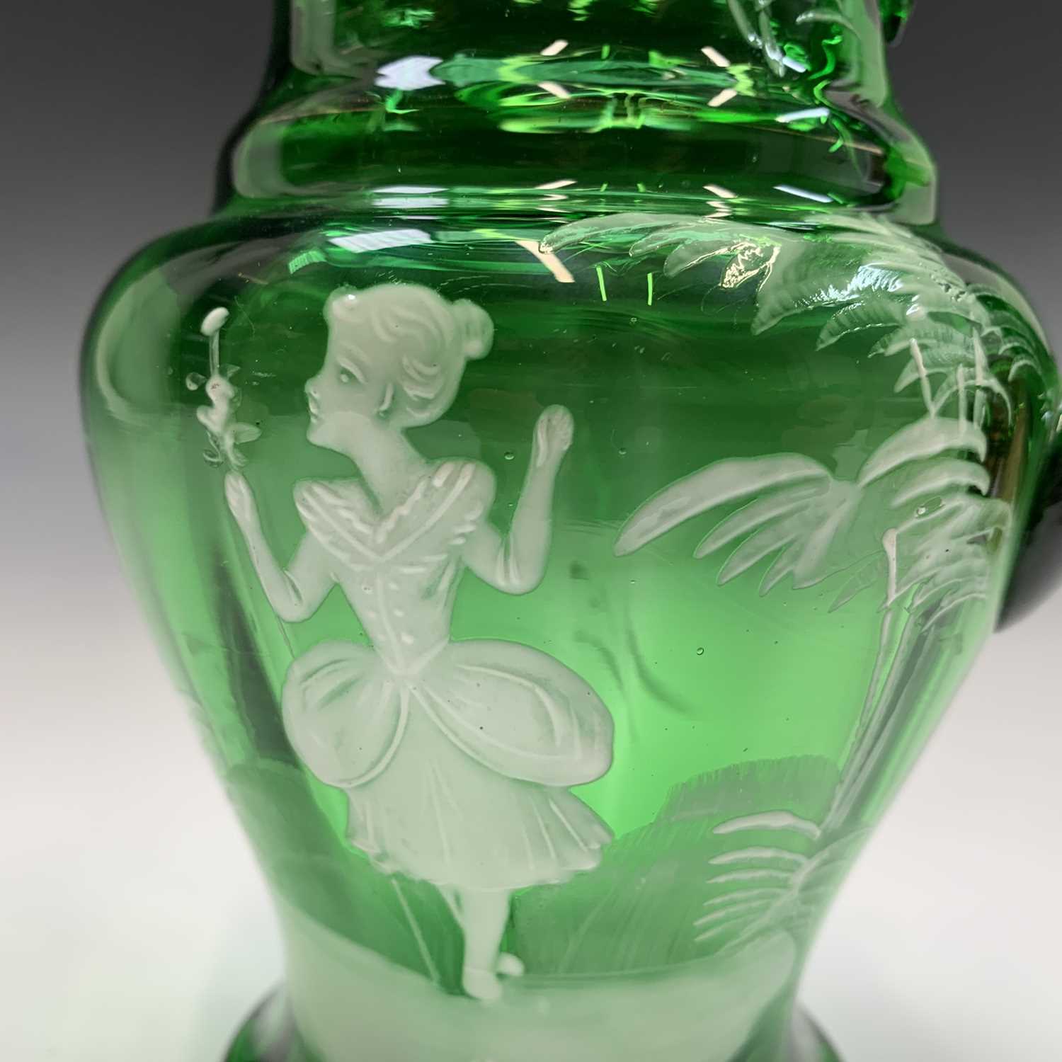 A Mary Gregory green glass jug, late 19th century, enamelled with a figure, height 17cm, together - Image 4 of 20