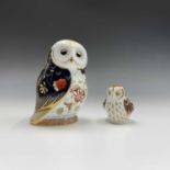 Two Royal Crown Derby paperweights, 'Daybreak Owl' and one other owl paperweight. Tallest 13.5cm