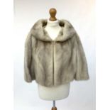 A 1950s pale mink evening bolero.Condition report: fur in good condition but tears to the lining
