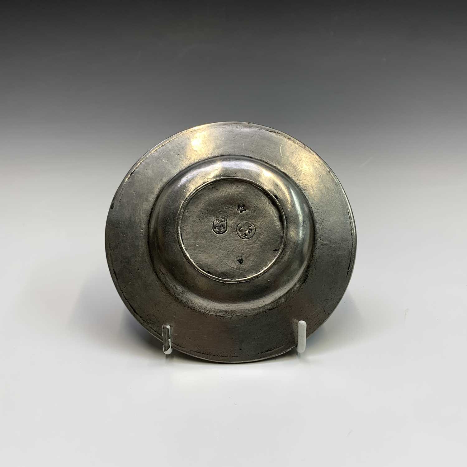 A 19th century pewter flagon with hinged cover, engraved with tulips and initialled G.A.K. and dated - Image 16 of 20