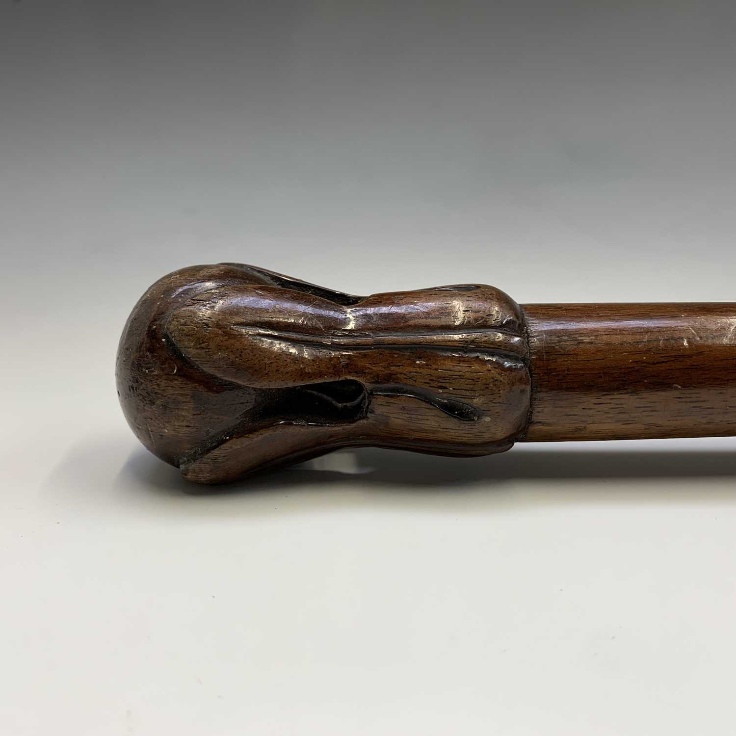 A lignum vitae cane, with turned knop, together with a further cane with carved finial, length - Image 2 of 5