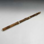 A 19th century boxwood and ivory flute, stamped 'Potter Johnson's Court Fleet Street London', one