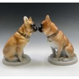 A pair of Russian Lomonosov porcelain figures of boxer dogs, on oval bases, height 22cm.